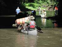 canoe full of trash